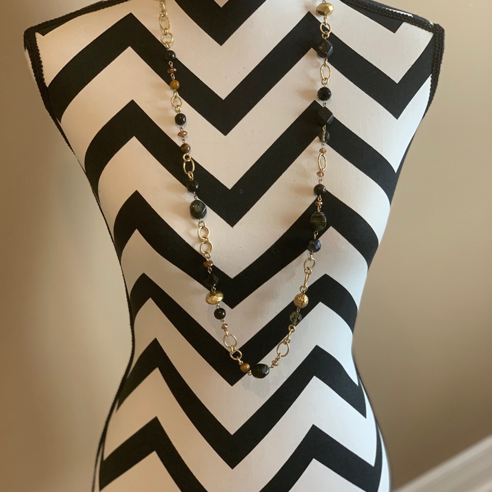 Long gold necklace with accents